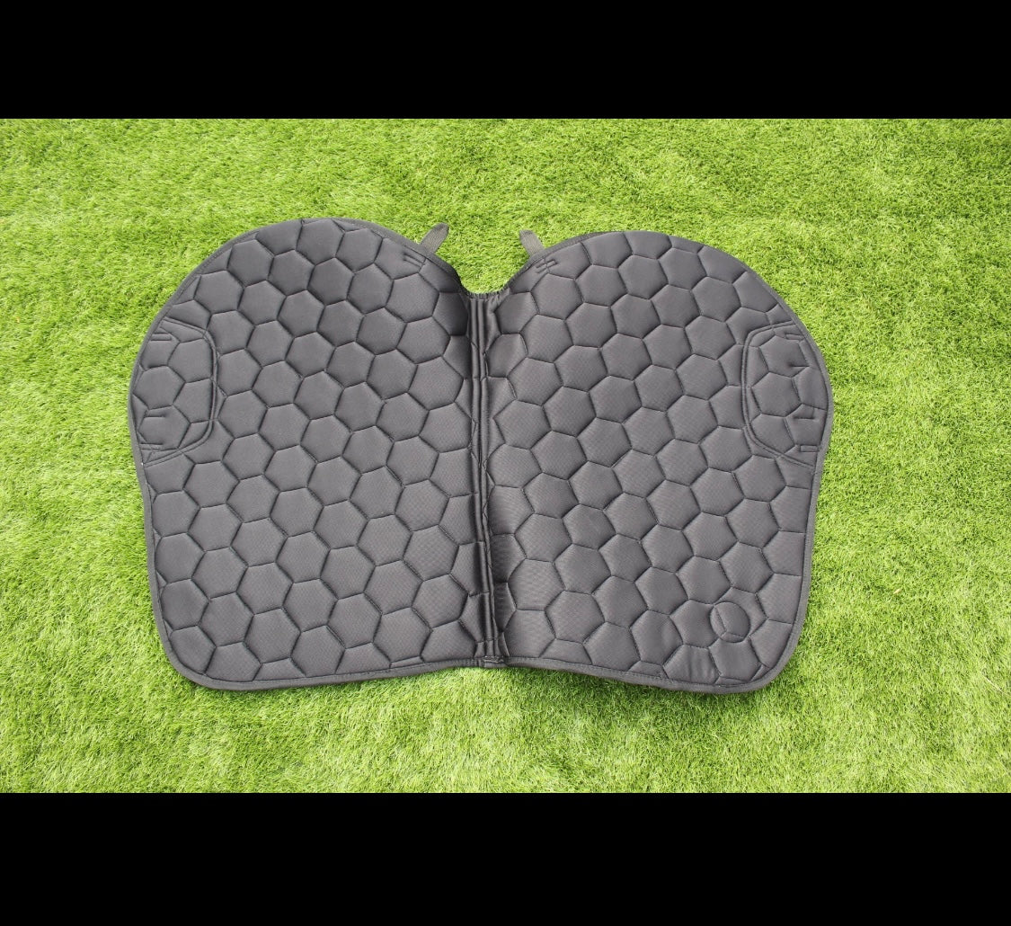 Luxury navy suede competition saddle pad numnah with white piping and diamontés on it.
