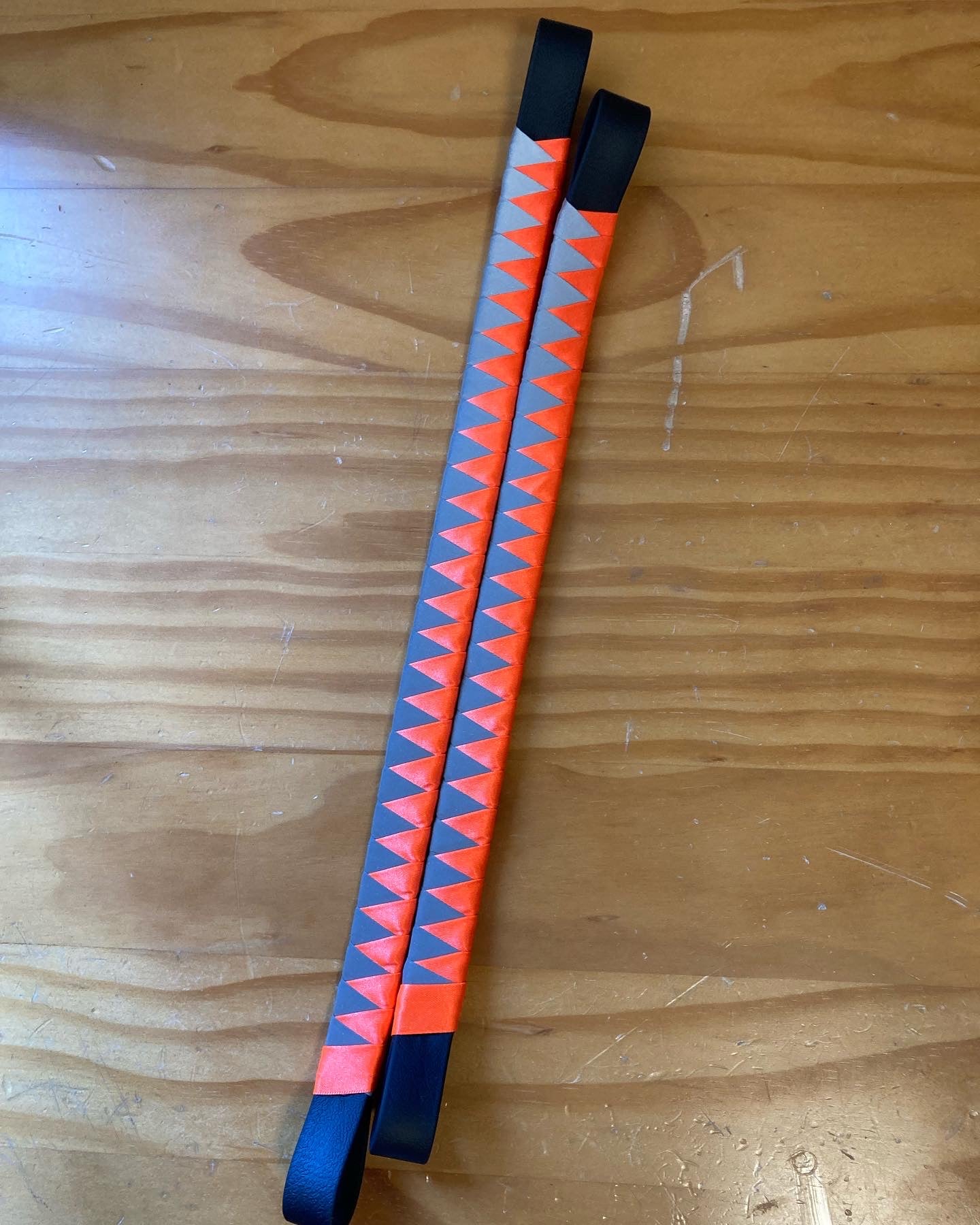 two bespoke high viz reflective and neon orange ribbon browbands