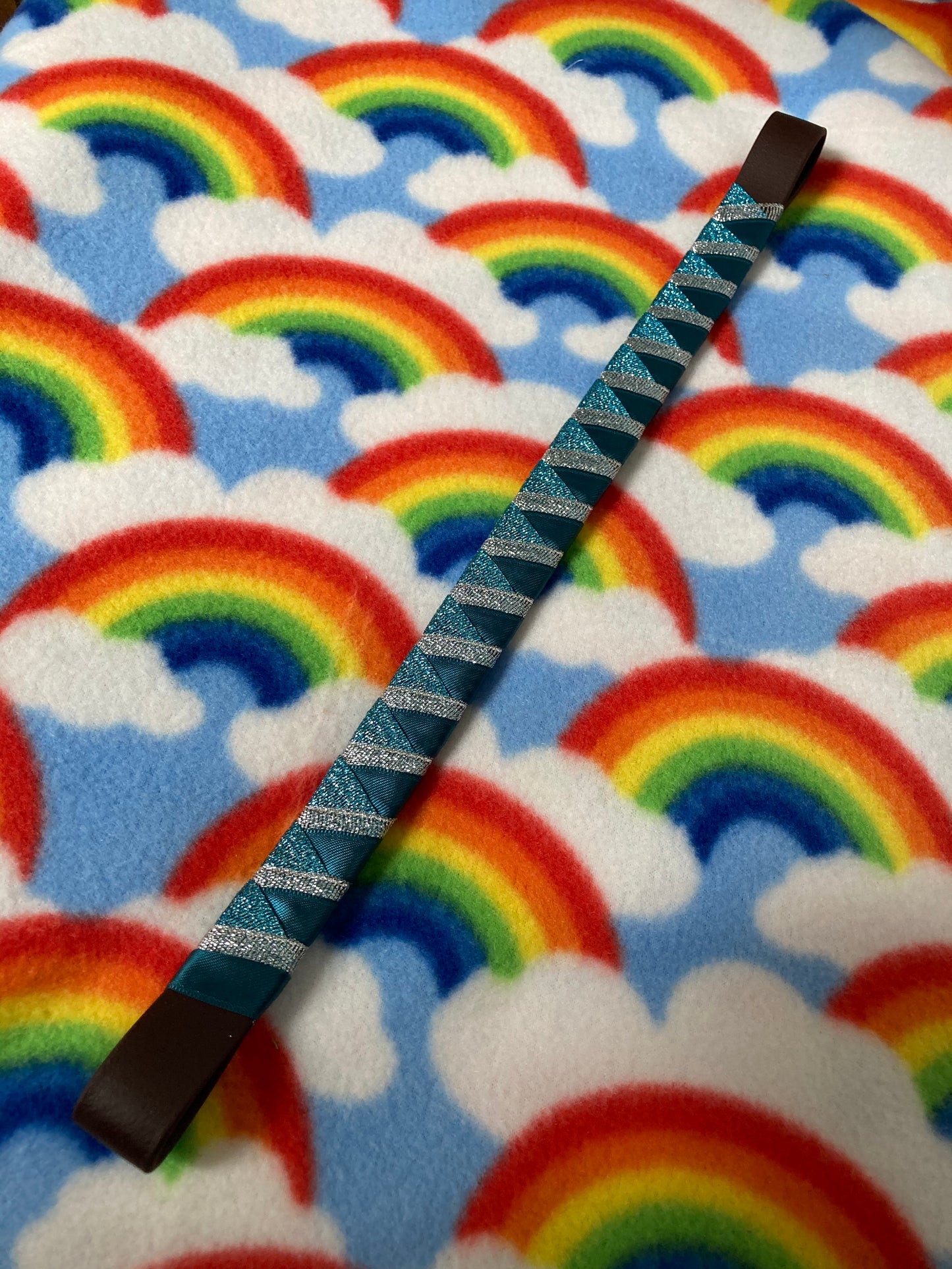 a teal and silver bespoke browband