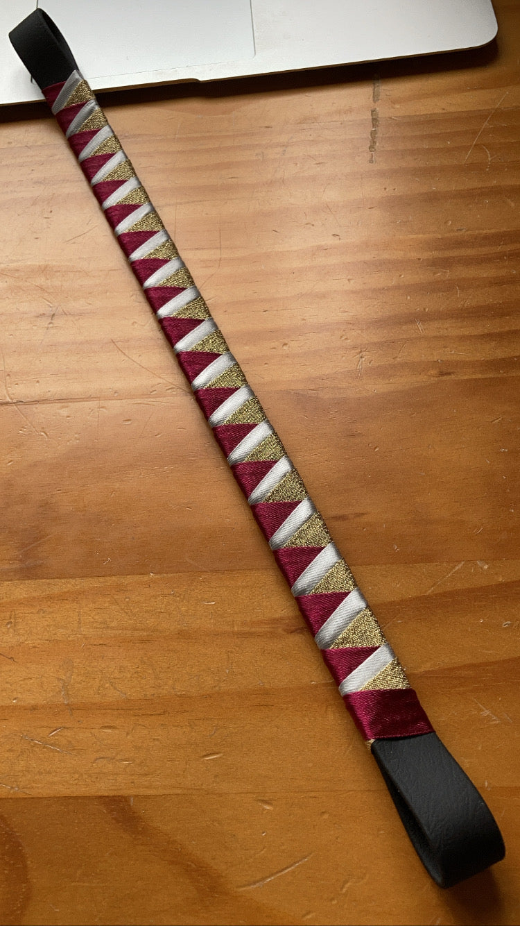 a gold, burgundy and white bespoke browband