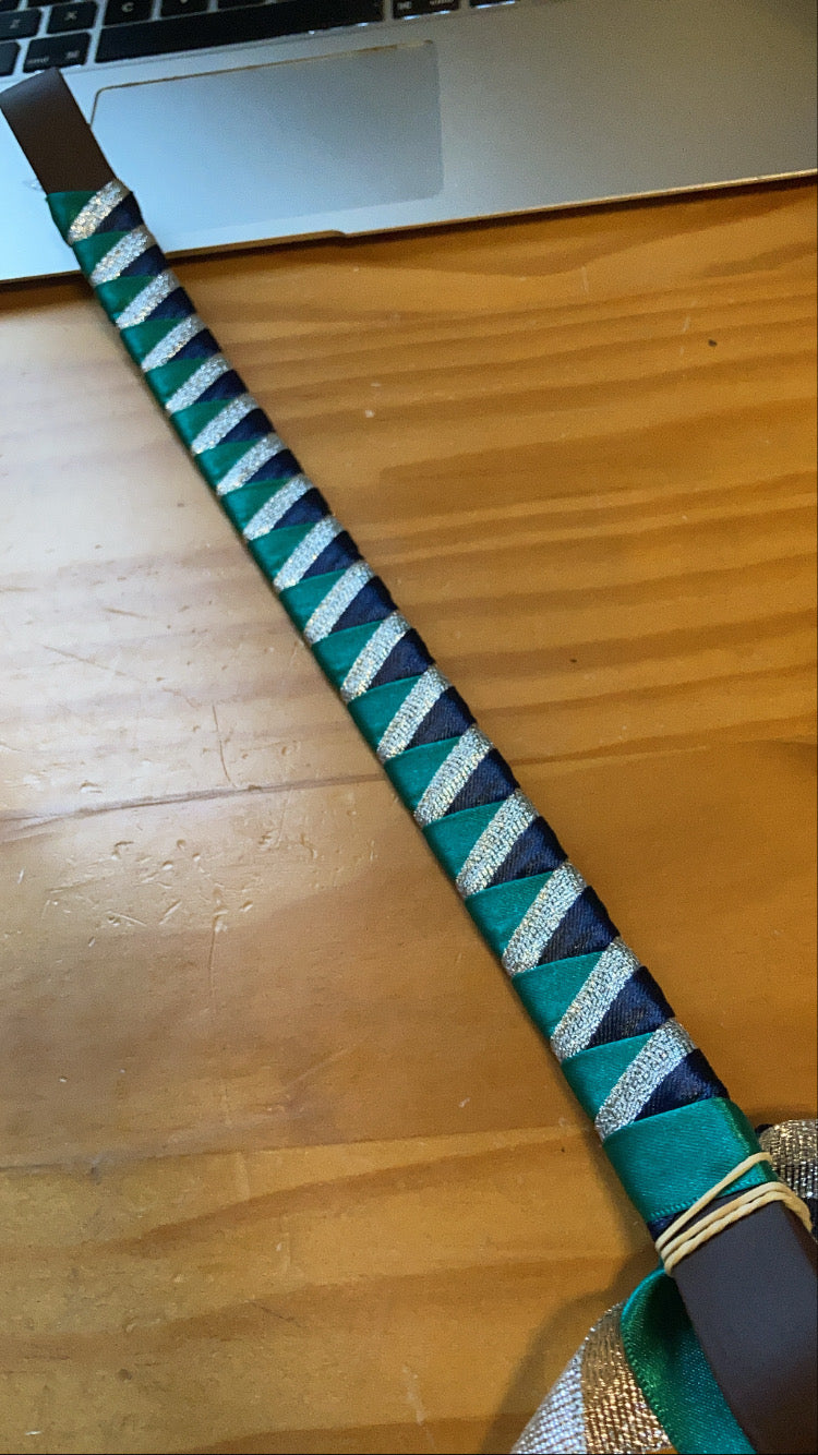 an emerald green, navy and silver browband
