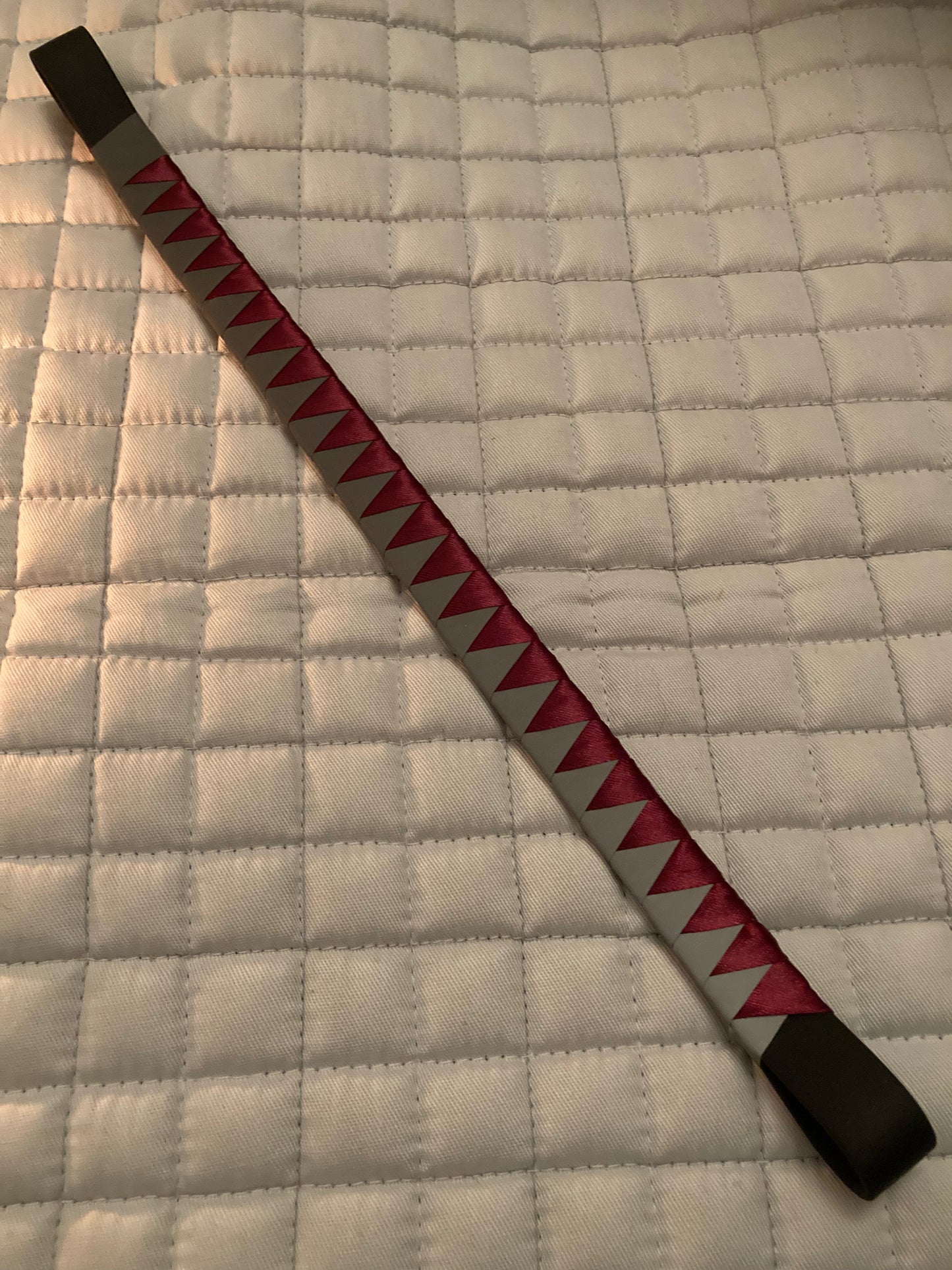a bespoke high viz browband with burgundy ribbon