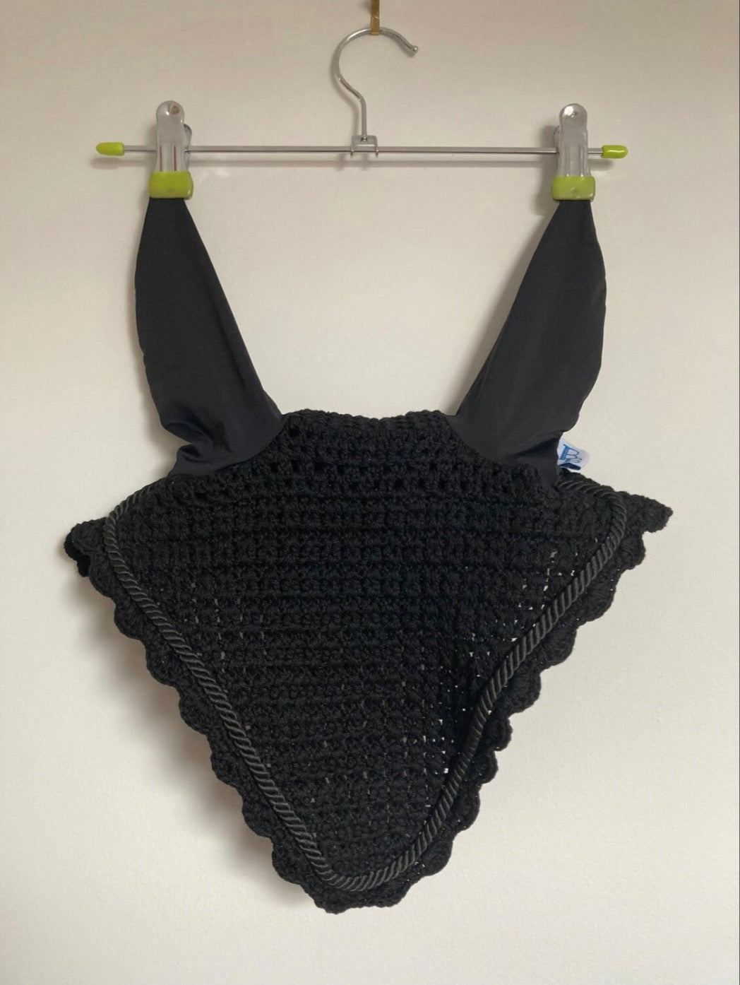 a black ear bonnet