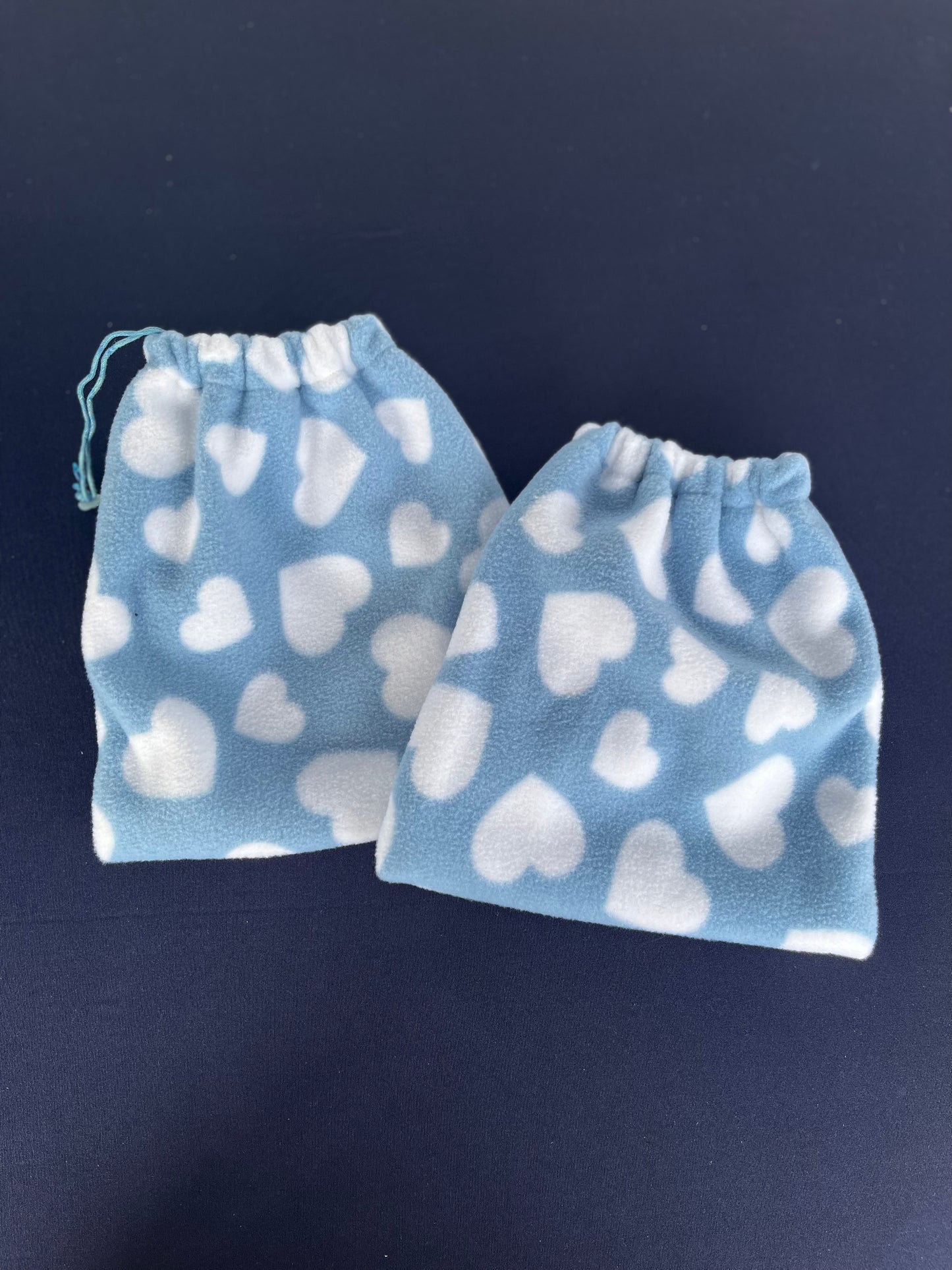 Blue stirrup covers with white hearts on