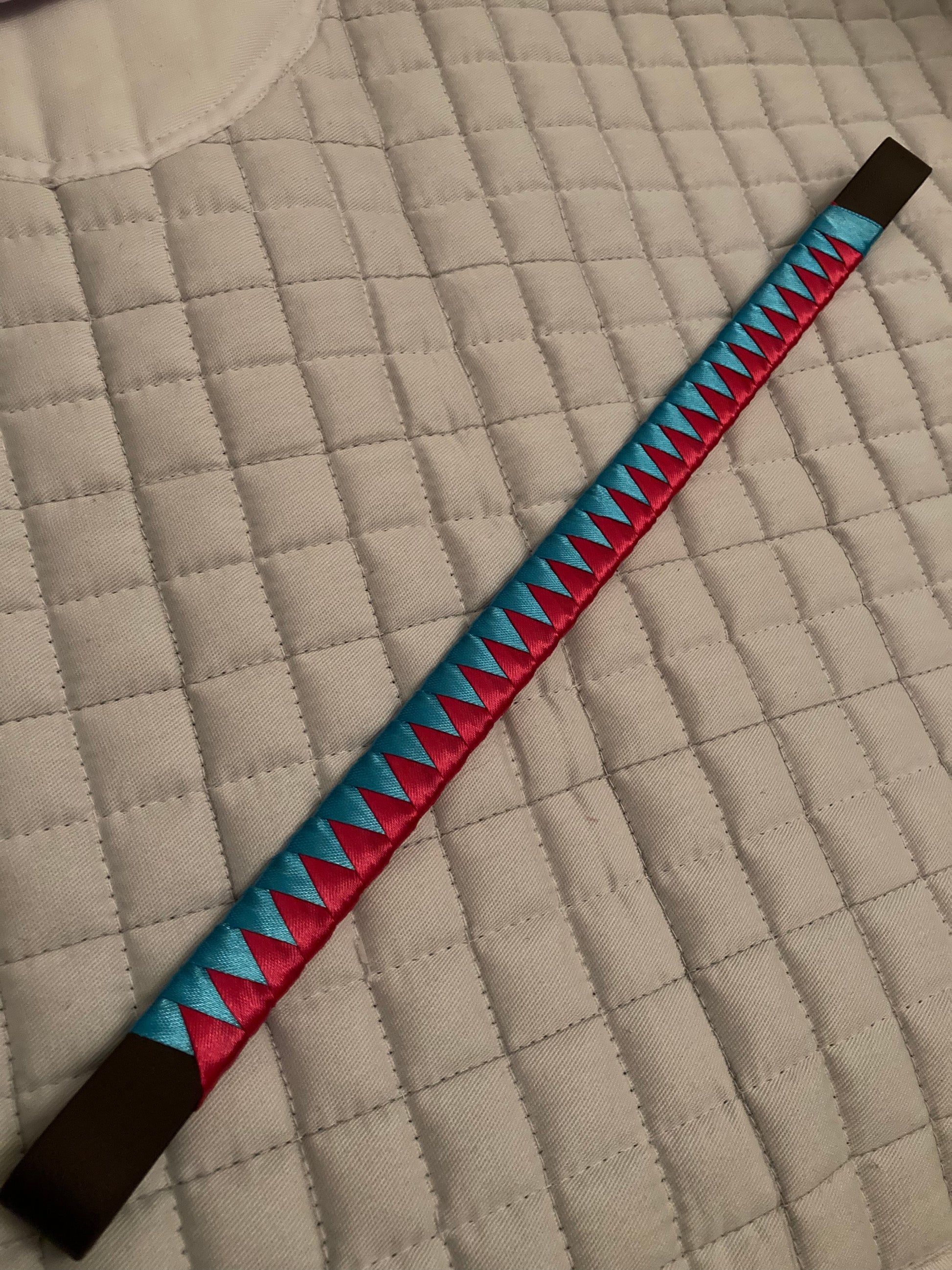 a turquoise and pink bespoke browband