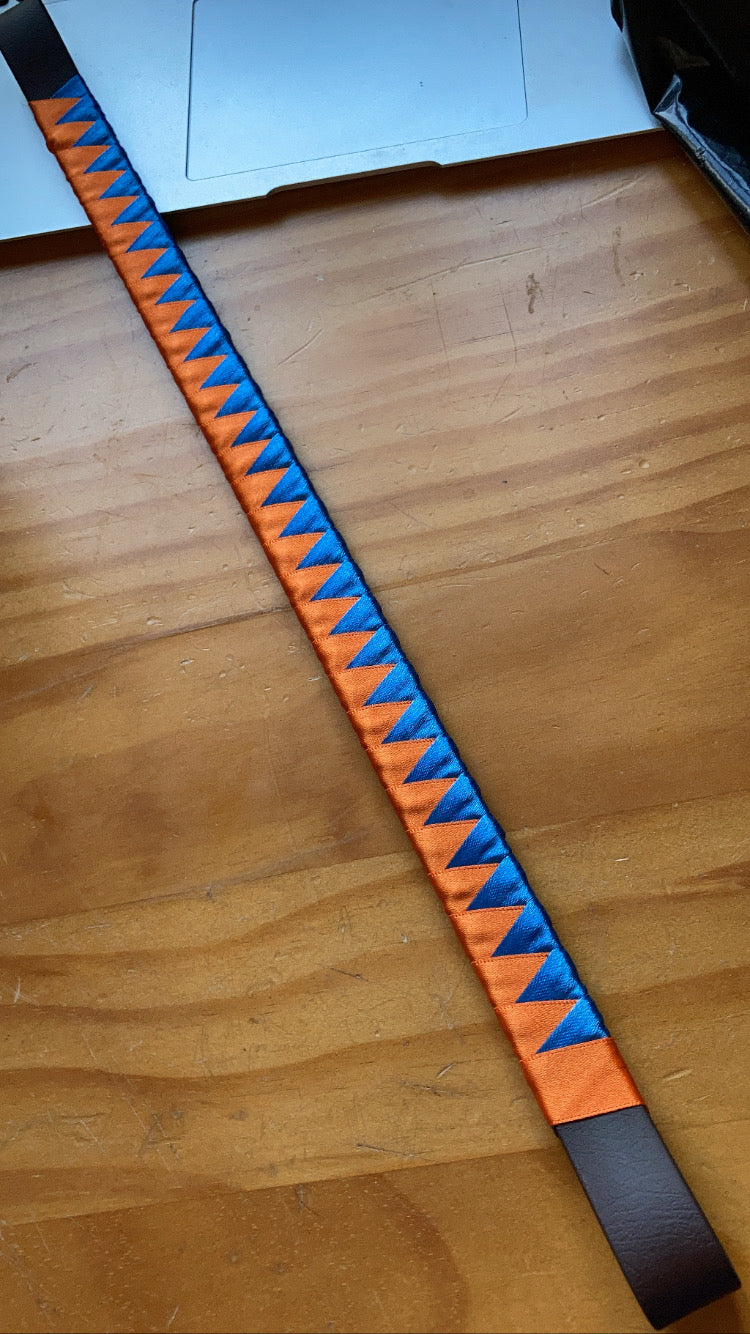 an orange and blue bespoke browband