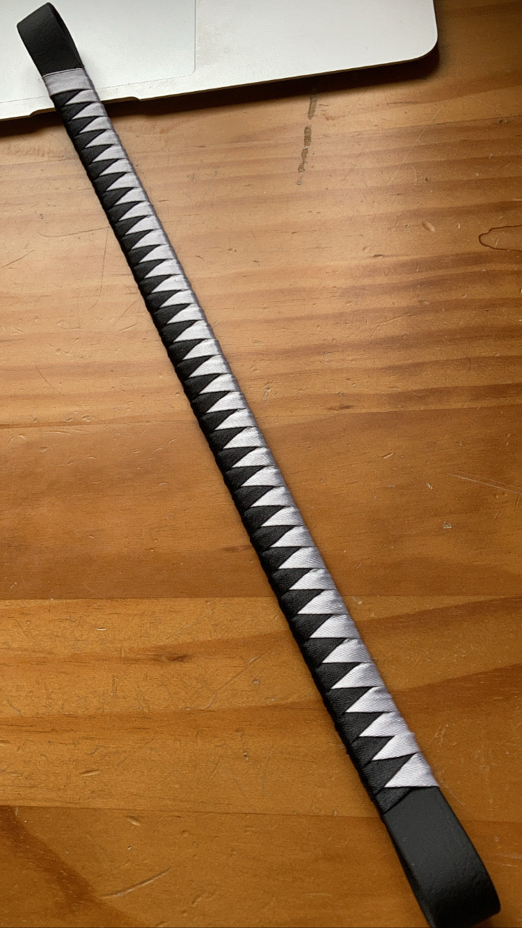 a black and white bespoke browband